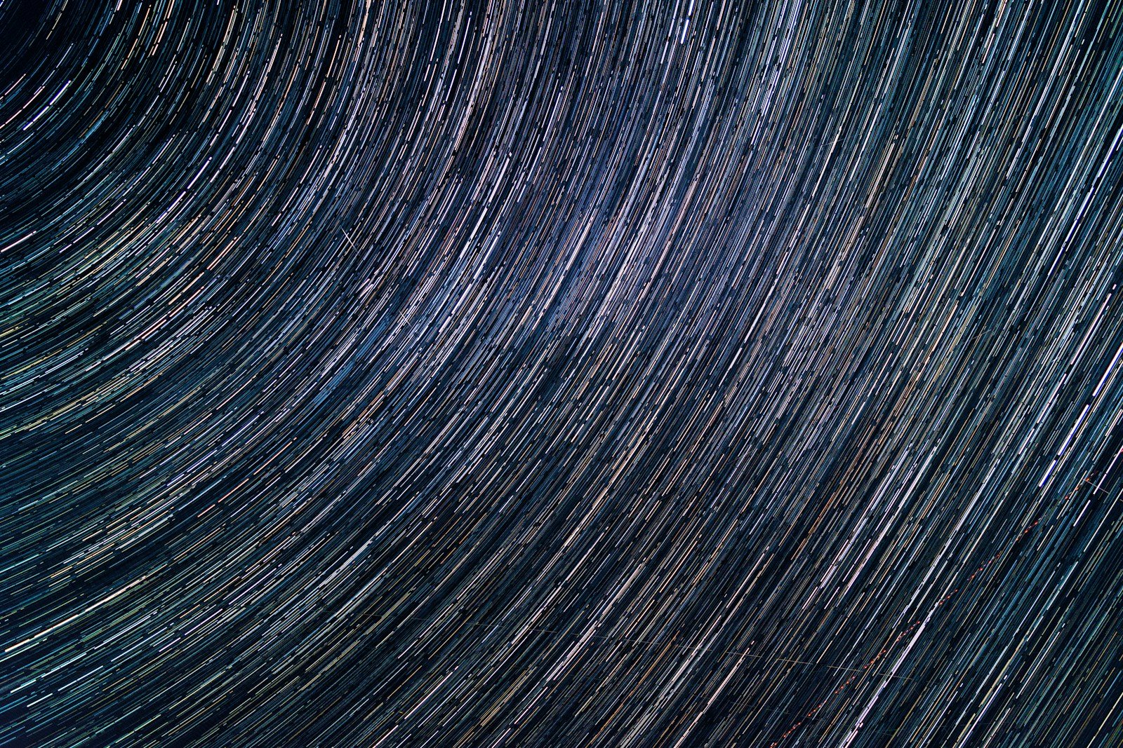 a star trail is seen in the night sky